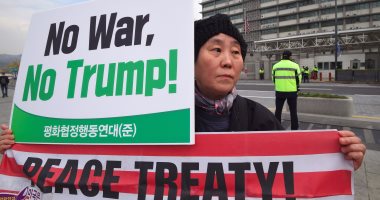 بالصور.. تظاهرات ضد ترامب فى كوريا الجنوبية تحت عنوان" لا للحرب"