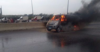 صور..حريق سيارة بطريق مصر الإسكندرية الصحراوى وبطء الحركة المرورية