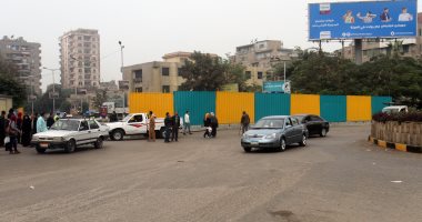 صور.. 7 ضباط و12 أمين شرطة و16 مجندا لملاحظة حركة السير بتحويلات شارع السودان