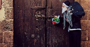 بابا نويل الفلسطينى.. سانتا كلوز يتضامن مع القدس ومصوره: السنة دى حداد