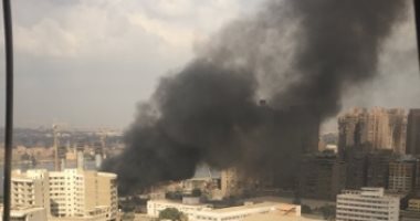 قارئ يشارك بصور لحريق أحد المبانى بجوار مستشفى معهد ناصر