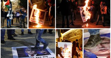  فلسطينيون يحرقون صور نائب ترامب فى بيت لحم خلال زيارته تل أبيب