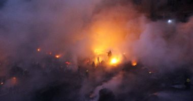 مصدر أمنى: ماس كهربائى وراء حريق مخزن الهرم والنيران امتدت لعقار مجاور