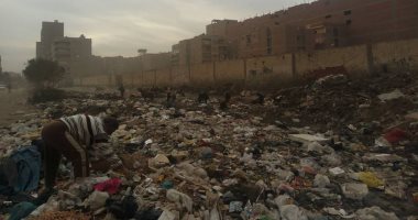 صور.. انتشار القمامة بشارع مكة المكرمة فى العمرانية