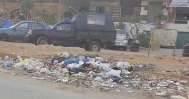قارئ يشكو تراكم القمامة بشارع حافظ رمضان فى مدينة نصر