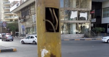 قارئ يرصد وجود كابلات عارية بأعمدة الكهرباء فى شارع جامعة الدول بالمهندسين