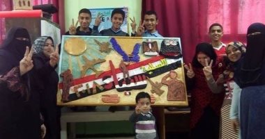  طلاب مدرسة بطور سيناء يرسمون جدارية للعملية الشاملة "سيناء 2018"