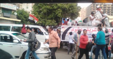صور.. "كلنا معاك من أجل مصر" تنظم وقفة بالدقى لحث المواطنين على التصويت