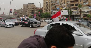 صور.. مسيرة بالسيارات بشارع جامعة الدول العربية للحث على التصويت بالانتخابات