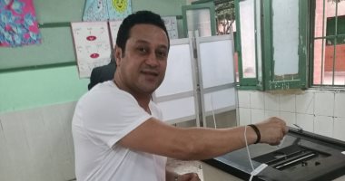 هشام حنفى لاعب الأهلى السابق يدلى بصوته فى انتخابات الرئاسة