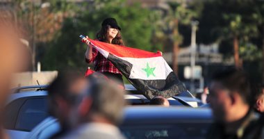 صباح دمشق أقوى من إرهابهم.. السوريون يتحدون العدوان الثلاثى بالأعلام السورية 