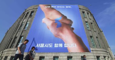 صور.. انتشار دعاية إعلانية فى شوارع سول تعكس وحدة شبه الجزيرة الكورية