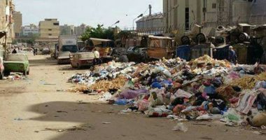 قارئ يشكو انتشار أكوام القمامة بشارع السادات فى الإسكندرية