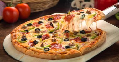 علماء وطهاة بإيطاليا يصنعون بيتزا صحية تحمى القلب 