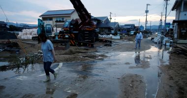 صور.. آثار مدمرة لفيضانات اليابان والآلاف يحاربون العطش