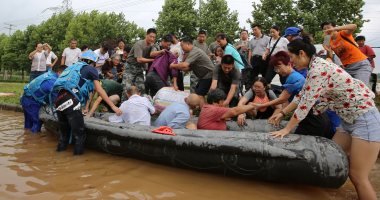 صور.. رجال الإنقاذ فى الصين يواصلون إجلاء السكان جراء إعصار رومبيا