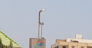 إضاءة أعمدة الإنارة فى "عز الظهر"  بحدائق الاهرام