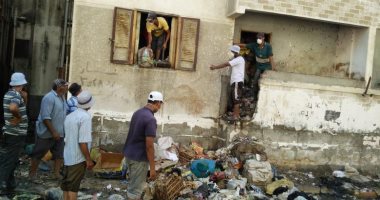 فيديو وصور.. حملة نظافة فى بورسعيد تكتشف تحول شقة لمقلب قمامة