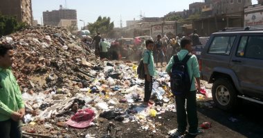 شكوى ترصد انتشار اكوام القمامة بجوار مدرستين بحى السلام