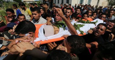 الفلسطينيون يودعون جثامين شهداء جمعة انتفاضة الأقصى