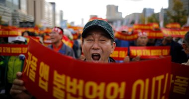 صور.. مظاهرات سائقى التاكسى فى كوريا الجنوبية ضد خدمة الكاربول