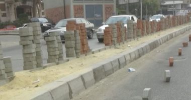 صور.. أعمال رصف وتطوير شوارع مصر الجديدة ومراقبة لحركة السيارات منعا للزحام
