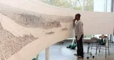قصة صورة.. فنان مصاب بالتوحد يرسم لوحة لمدينة نيويورك بعد جولة 20 دقيقة 