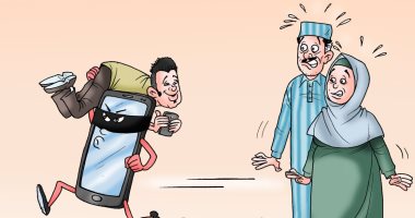 اختطاف الهواتف الذكية للشباب لعالم التواصل الاجتماعى بكاريكاتير "اليوم السابع"