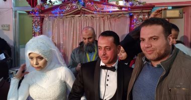 صور.. عروسان يجريان الكشف الطبى ضمن مبادرة 100 مليون صحة بكفر الشيخ