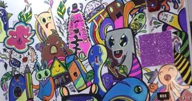 "دنيا" تشارك برسومات فنية لـ"بورتريه مانديلا" باستخدام الألوان
