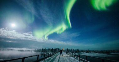 صور.. أضواء الشفق القطبى المبهرة تضئ سماء فنلندا باللون الأخضر