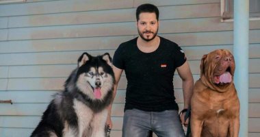 أنا وأليفى.. أحمد يشارك مع كلبيه اسكاى وروكى: بيفوزوا فى المسابقات