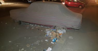 قارئ يطالب بإزالة السيارات المركونة من فترة طويلة في شارع الثورة بالدقى