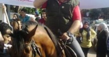 مسيرة بالمزمار البلدى والأحصنة بالشرابية لحث المواطنين على المشاركة