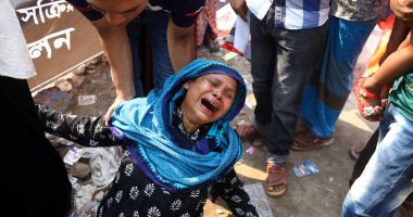 صور .. آلاف المواطنين يحيون ذكرى انهيار مبنى"رنا بلازا" ويطالبون بالقصاص للمتوفيين فى بنجلاديش