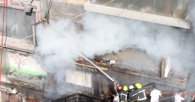 ندب الأدلة الجنائية لمعاينة آثار حريق شقة فى الموسكى
