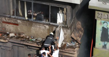 صور.. الصحة: إصابة 15 مواطنًا فى حريق بمنطقة الموسكى