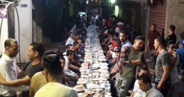 "شوارع الجدعان".. إفطار جماعى فى إمبابة يضم 250 صائما