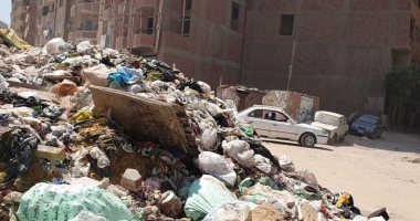 شكوى من تراكم القمامة والخردة فى شارع معهد ناصر 