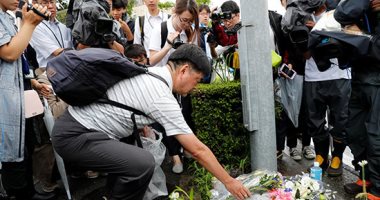 اليابانيون يشاركون فى تأبين ضحايا حريق ستوديو "كيوتو"