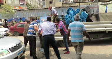 صور.. حملة أمنية مكبرة لتطهير شوارع العاصمة من الإشغالات فى القاهرة