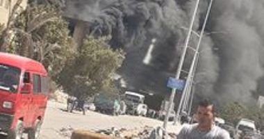 قارئ يشارك بصور لحريق ضخم لمصنع بأكتوبر
