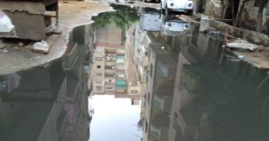 صور.. استمرار معاناة سكان شارع عرفة بالمريوطية الهرم من مياه المجارى