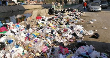 شكوى من انتشار القمامة بشارع الوحدة بإمبابة