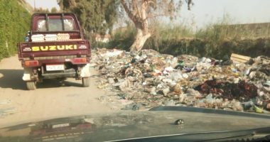 قارئ يشكو تراكم القمامة بطريق مصرف ترسا الكونيسة امتداد شارع عثمان 