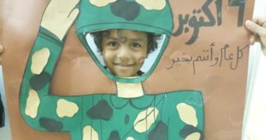 قارئ يشارك بصورة ابنه: يتمنى أن يصبح جنديا للدفاع عن مصر ورفع رايتها بالنصر 