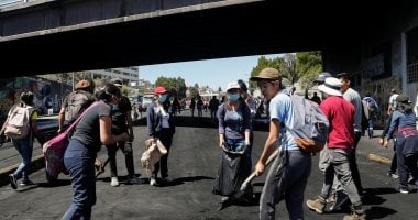 تنظيف الشوارع فى الإكوادور بعد احتجاجات الأيام الأخيرة