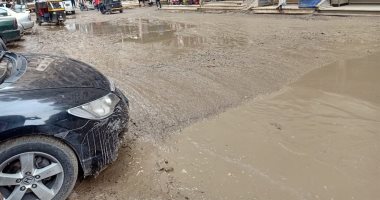 صور.. تجمعات لمياه الأمطار بشارع الملكة فى فيصل والأهالى يطالبون بسحبها