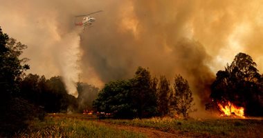 جحيم الغابات يحاصر استراليا.. النيران تلتهم مدرستين و100 منزل ومصرع 3 أشخاص
