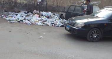 شكوى من انتشار القمامة فى شارع العلمين بالعجوزة